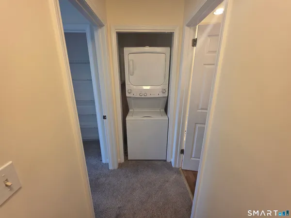 a view of a bathroom from a hallway