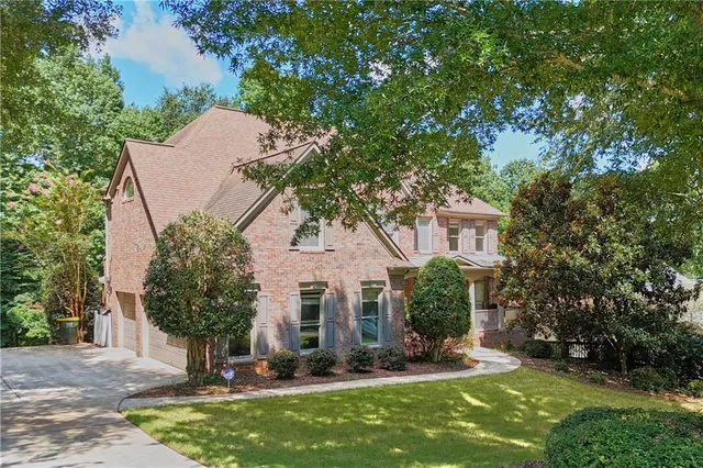 front view of a house with a yard