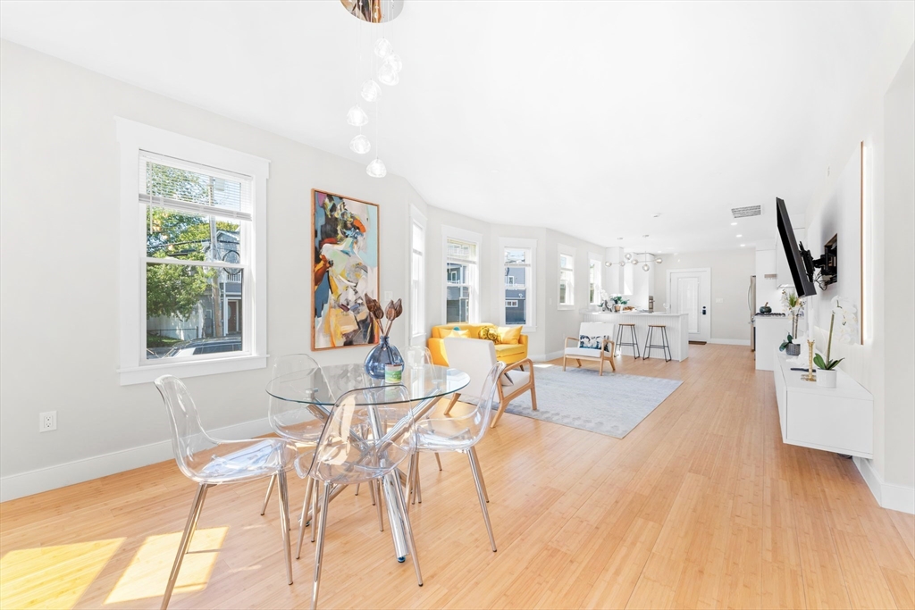 86 Cypress Street, Unit 86 Watertown, MA 02472 - Photo 1 of 38 a view of a living room and dining room