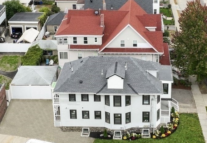 86 Cypress Street, Unit 86 Watertown, MA 02472 - Photo 38 of 38 an aerial view of residential houses with yard