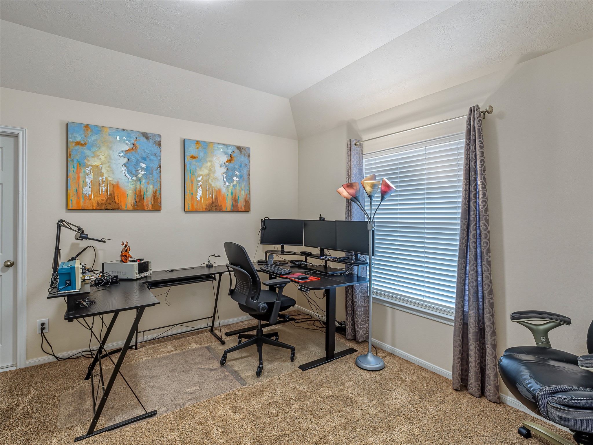 2210 Fox Path Katy, TX 77494 - Photo 31 of 47 Currently utilized as a high-powered home office and electronics lab, this spacious upstairs bedroom perfectly demonstrates the incredible versatility of the home's secondary rooms.