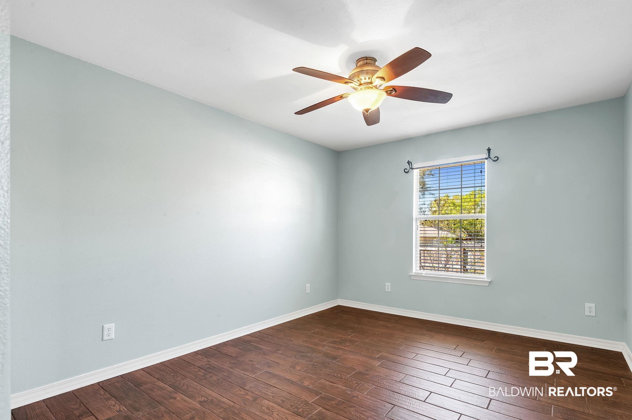 16444 Hamlet Lane Foley, AL 36535 - Photo 30 of 49 Unfurnished room featuring dark wood-style floors and baseboards