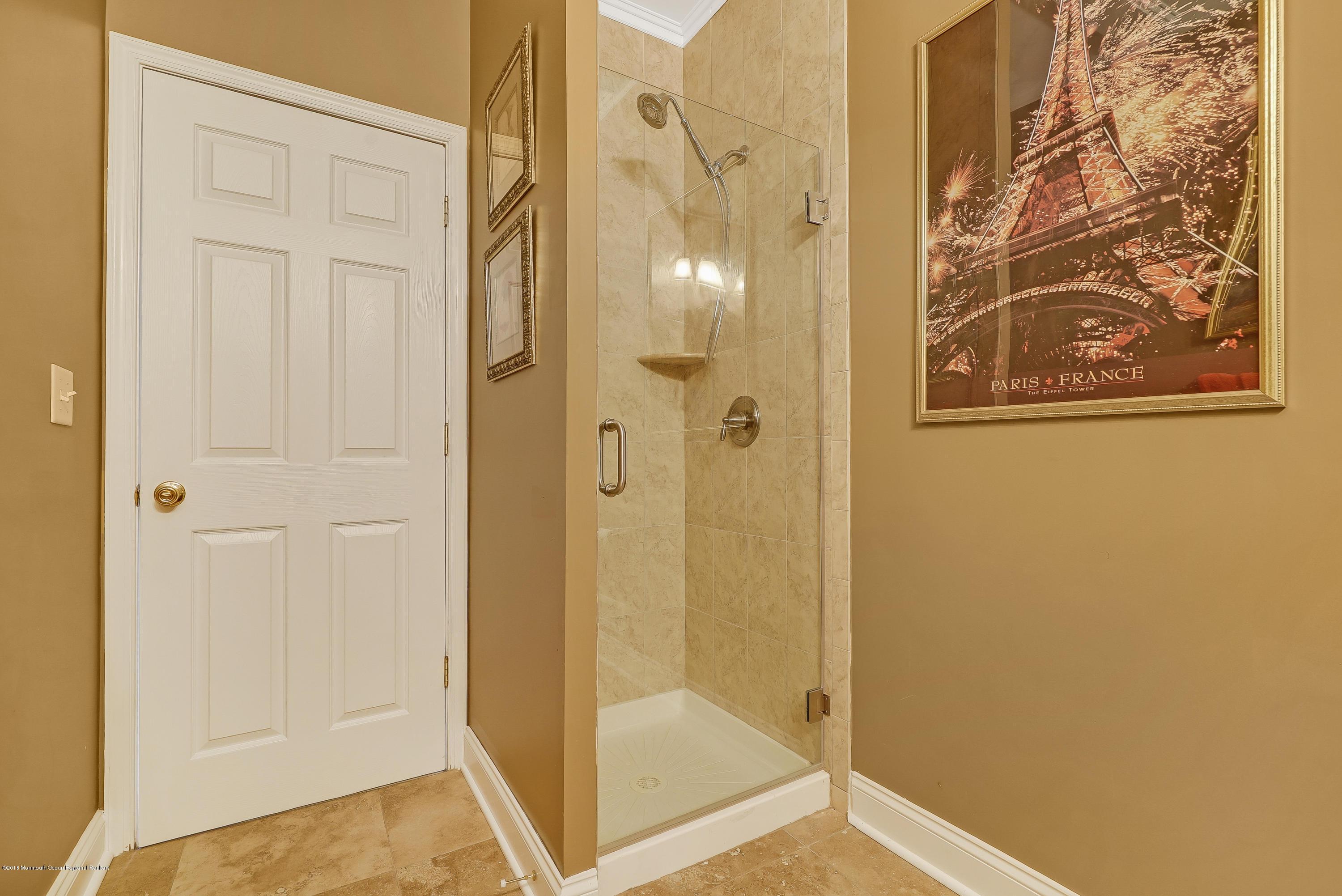 18 Mariners Bend Brielle, NJ 08730 - Photo 17 of 30 a bathroom with a glass shower door