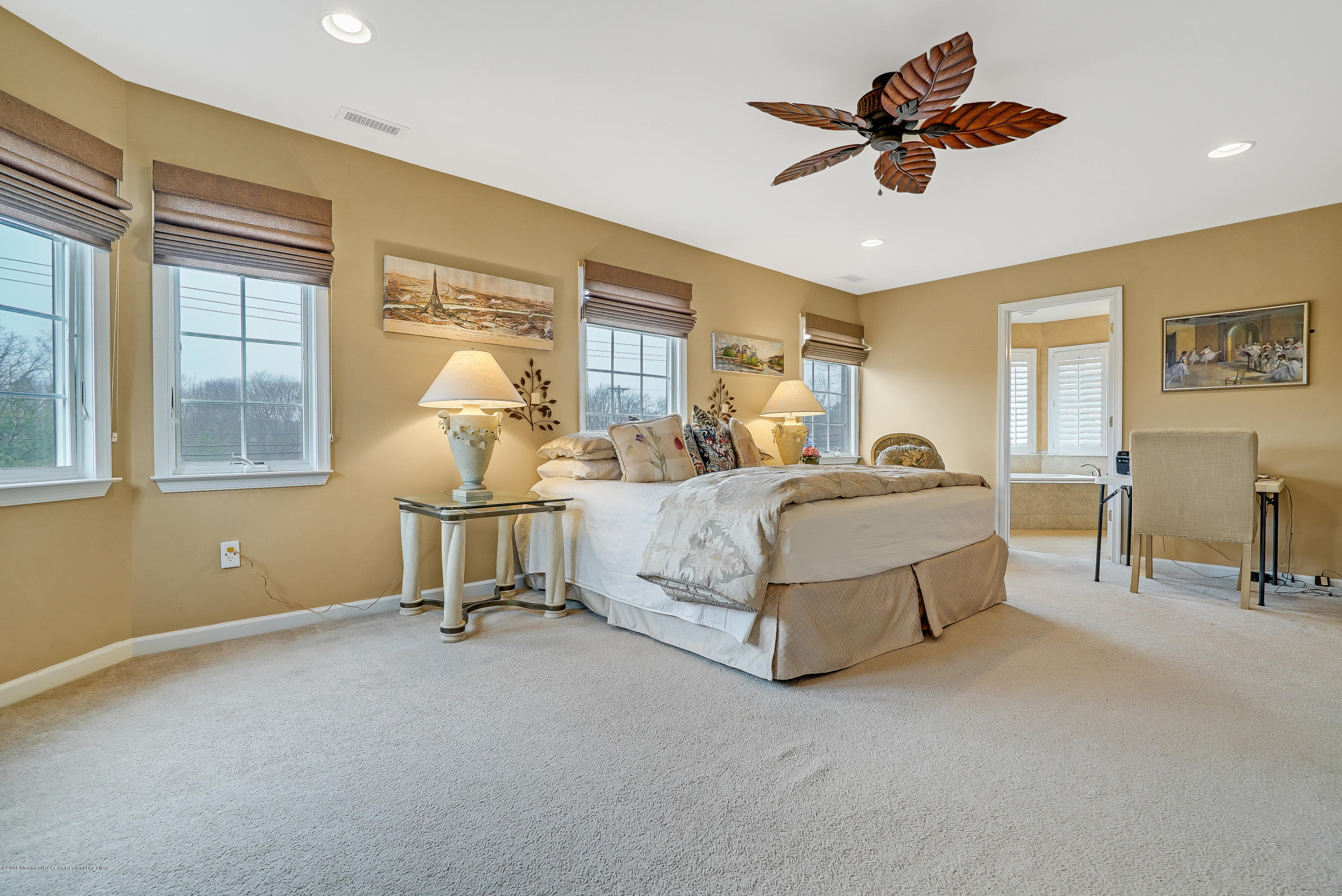 18 Mariners Bend Brielle, NJ 08730 - Photo 18 of 30 a bedroom with a bed couch and window