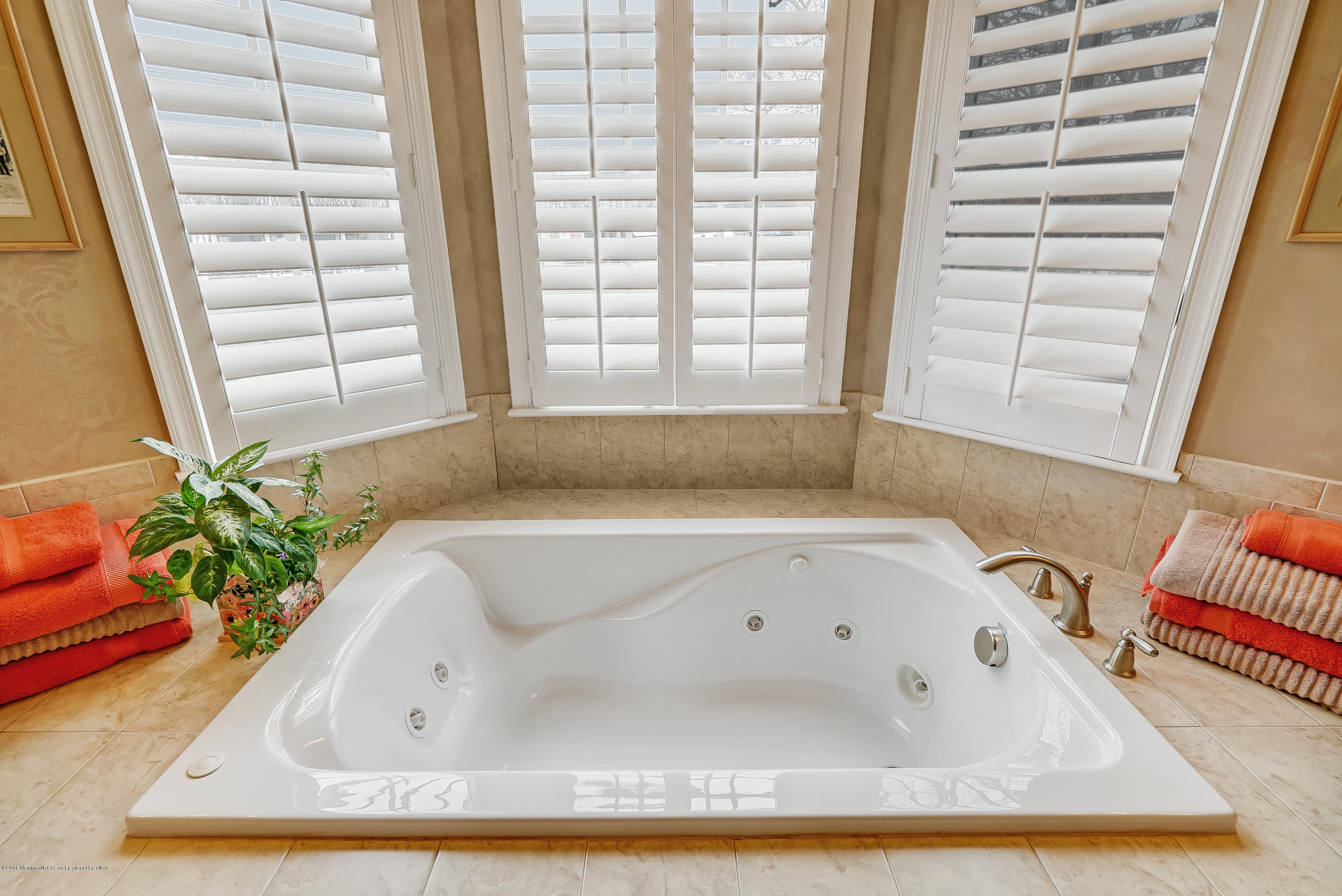 18 Mariners Bend Brielle, NJ 08730 - Photo 20 of 30 a bathroom with bathtub and window