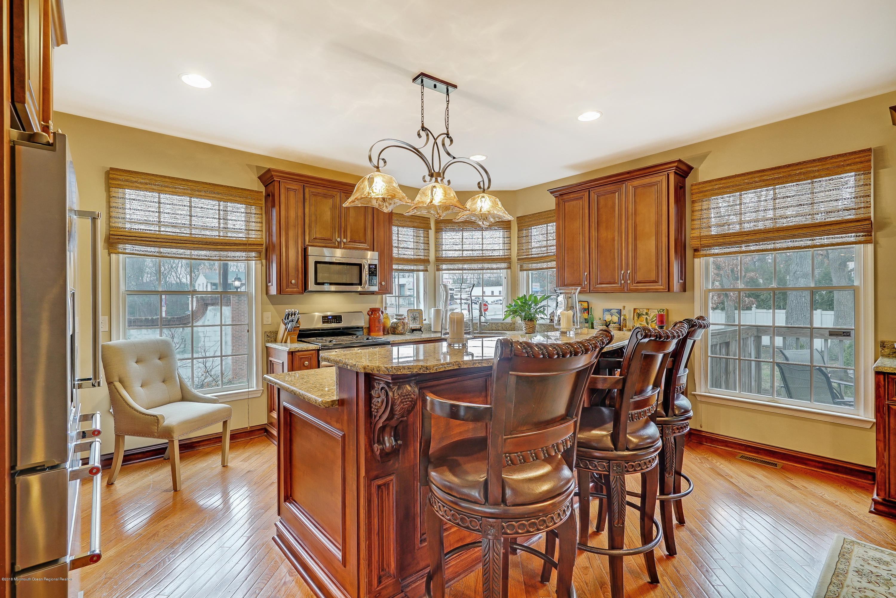 18 Mariners Bend Brielle, NJ 08730 - Photo 10 of 30 a view of a dining room with furniture wooden floor and chandelier