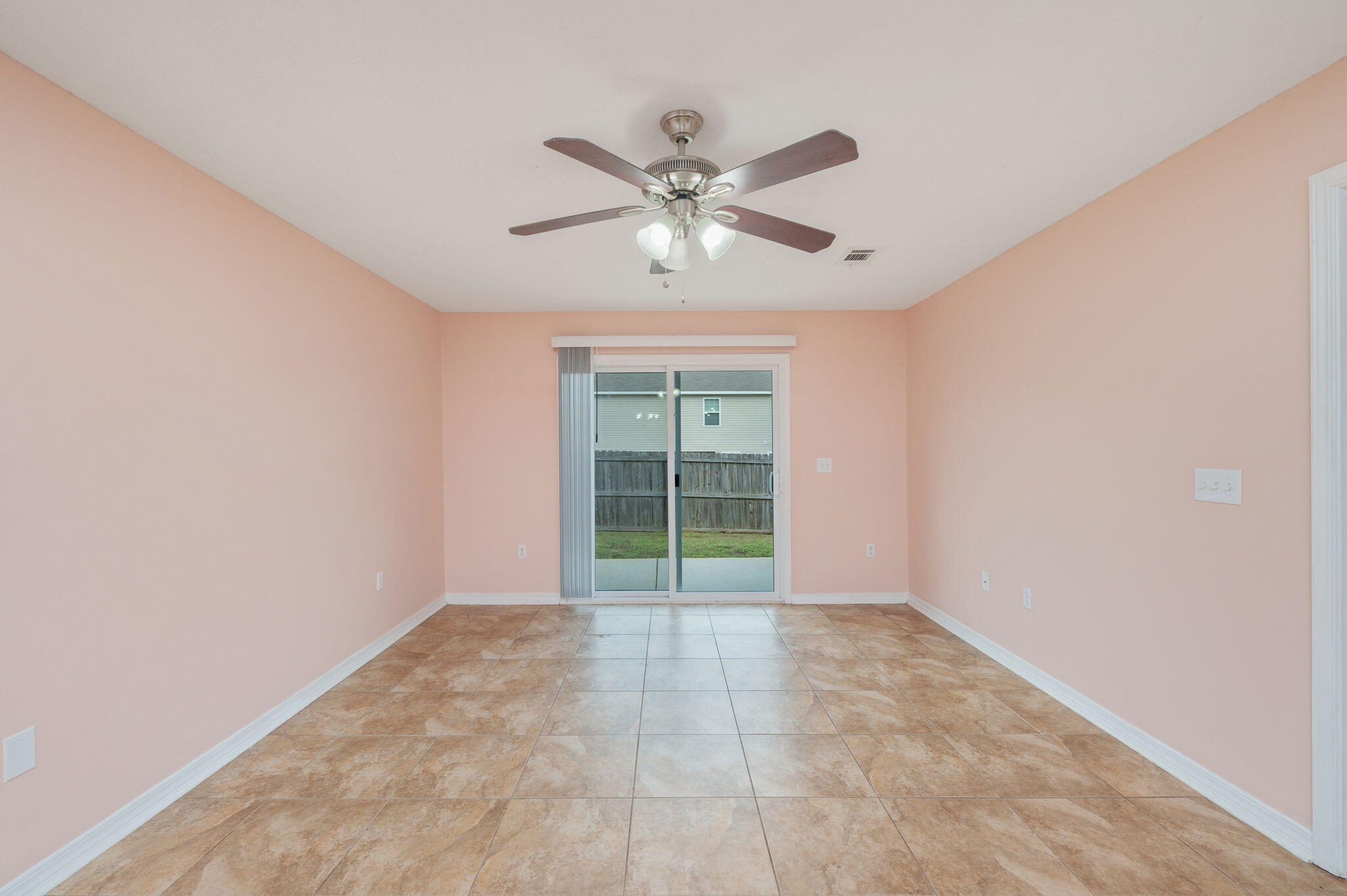 200 Wainwright Drive Crestview, FL 32539 - Photo 11 of 42 a view of an empty room with a window