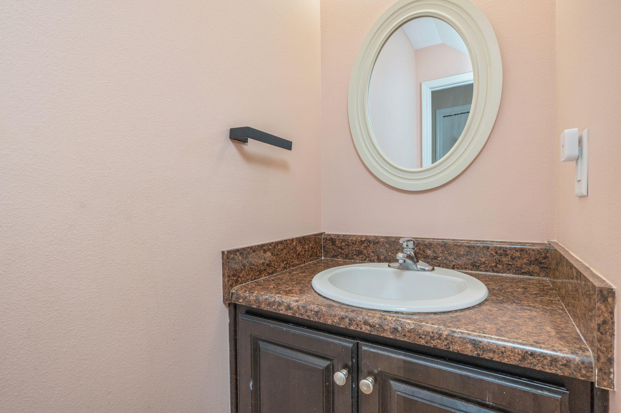 200 Wainwright Drive Crestview, FL 32539 - Photo 24 of 42 a bathroom with a granite countertop sink and a mirror