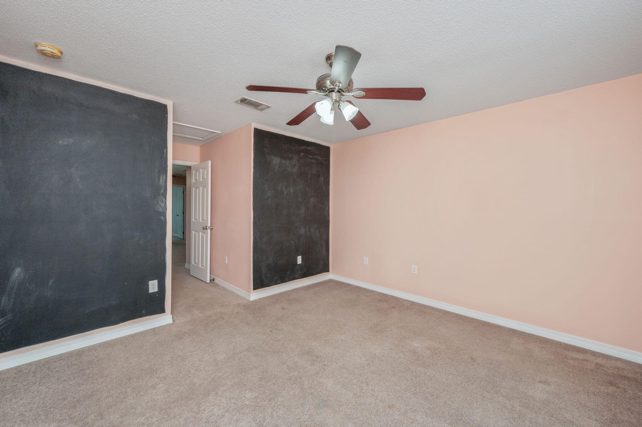 200 Wainwright Drive Crestview, FL 32539 - Photo 33 of 42 an empty room with closet and a chandelier fan