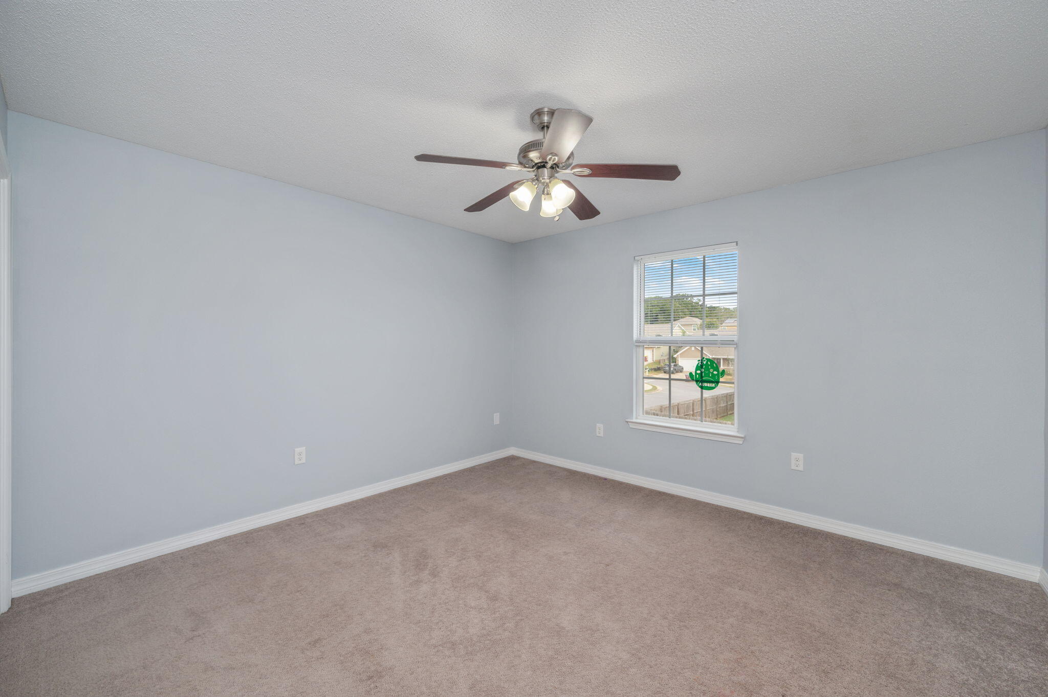 200 Wainwright Drive Crestview, FL 32539 - Photo 34 of 42 a view of an empty room with a window