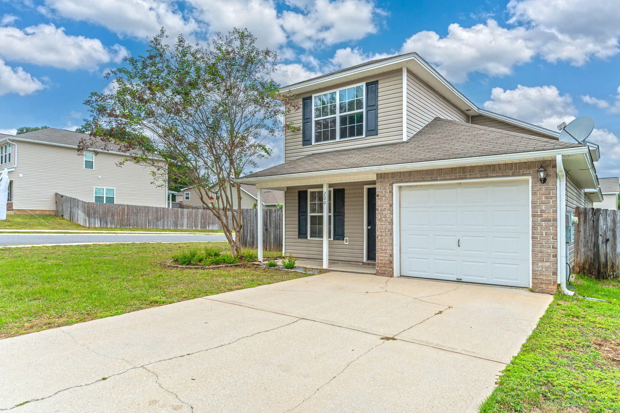 200 Wainwright Drive Crestview, FL 32539 - Photo 4 of 44 a front view of a house with a yard