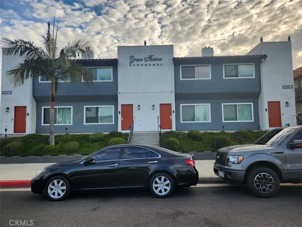 a car parked in front of a house