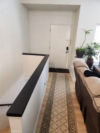 a hallway with seating area