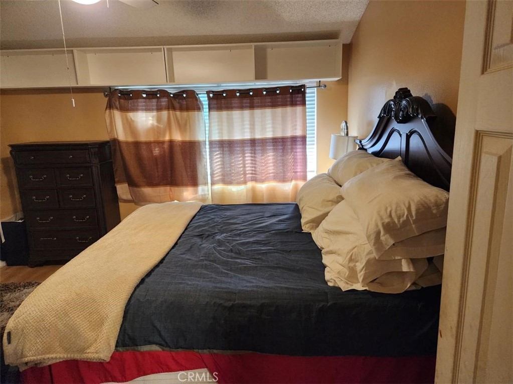 21730 Grace Avenue, Unit 2 Carson, CA 90745 - Photo 23 of 36 a bedroom with a bed and a closet