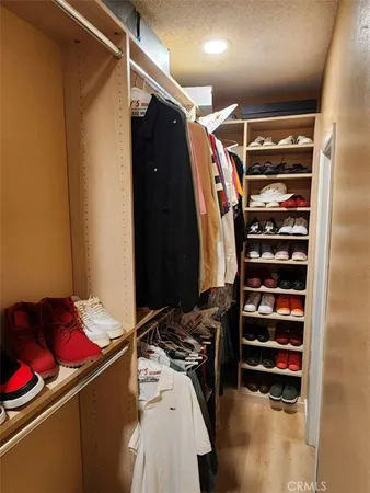 a room with lots of different colored cloths