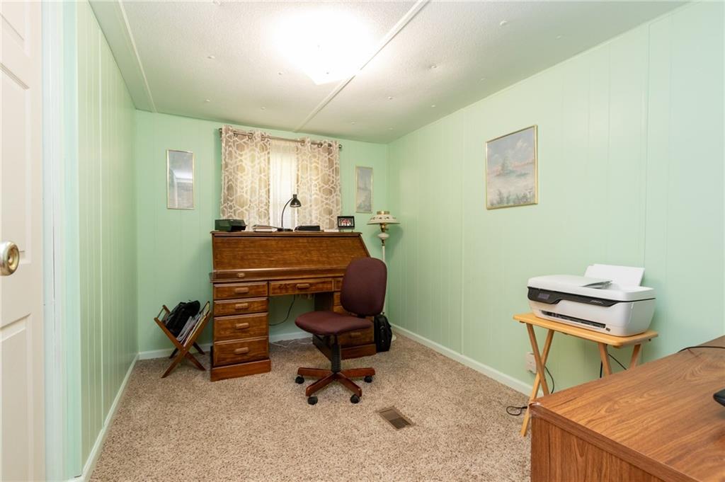 392 Upper Service Road Hookstown, PA 15050 - Photo 6 of 23 Dining room new flooring. Walk out to rear deck.