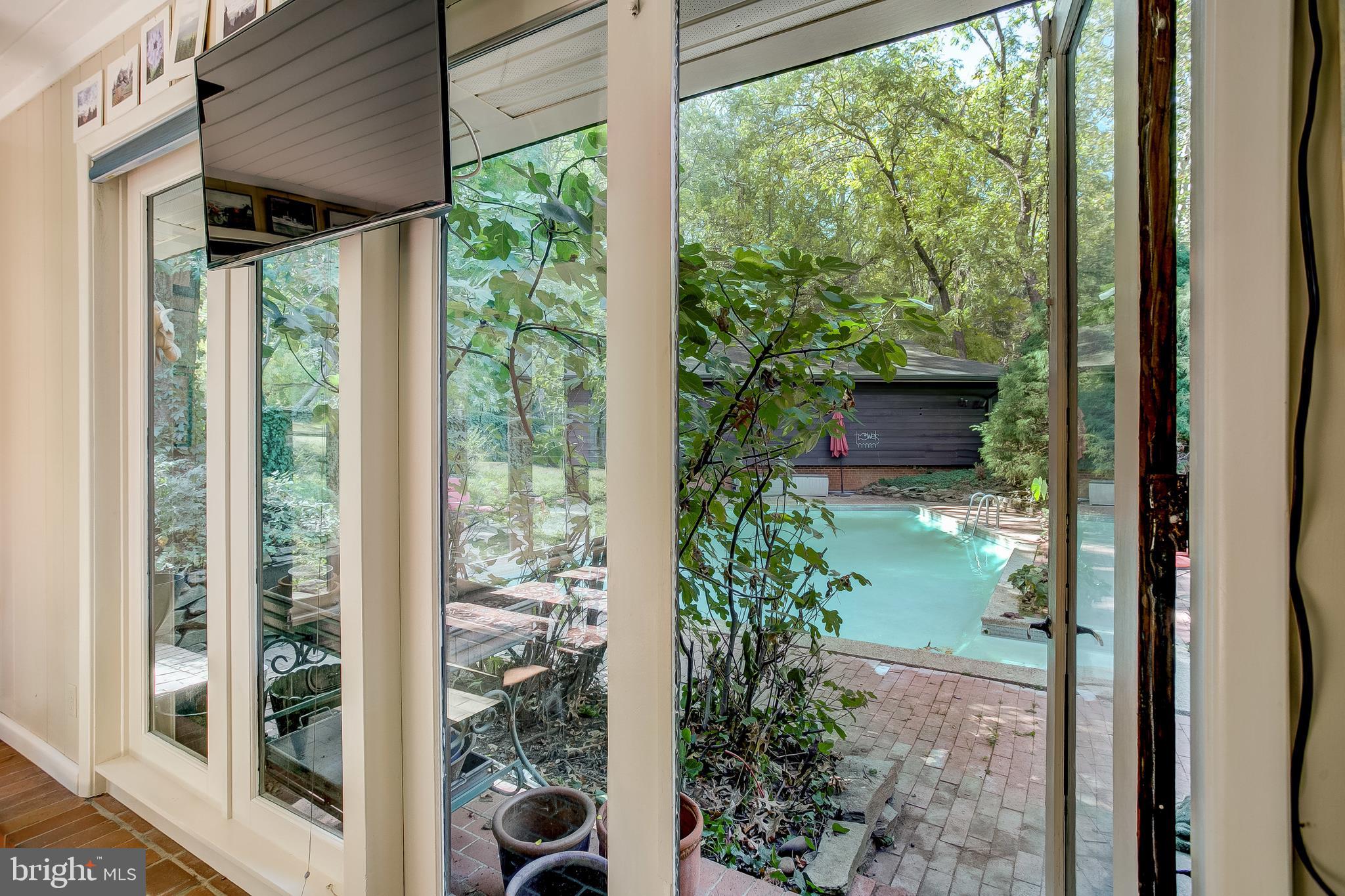 14505 Cactus Hill Road Accokeek, MD 20607 - Photo 49 of 83 French doors lead to heated Pool