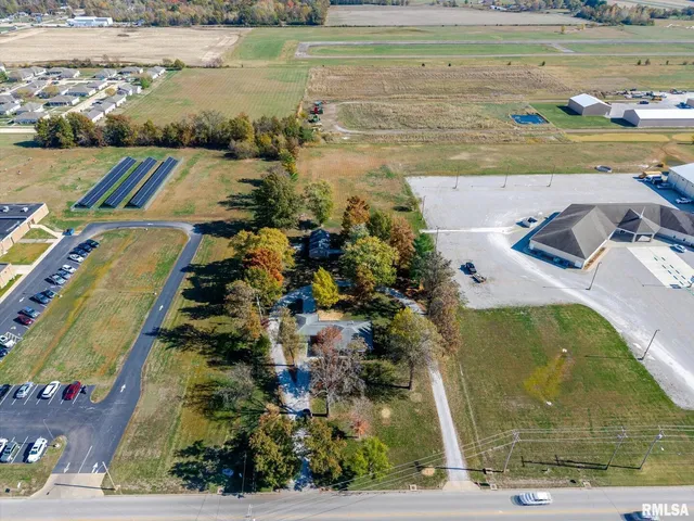 an aerial view of ocean with residential building and ocean view