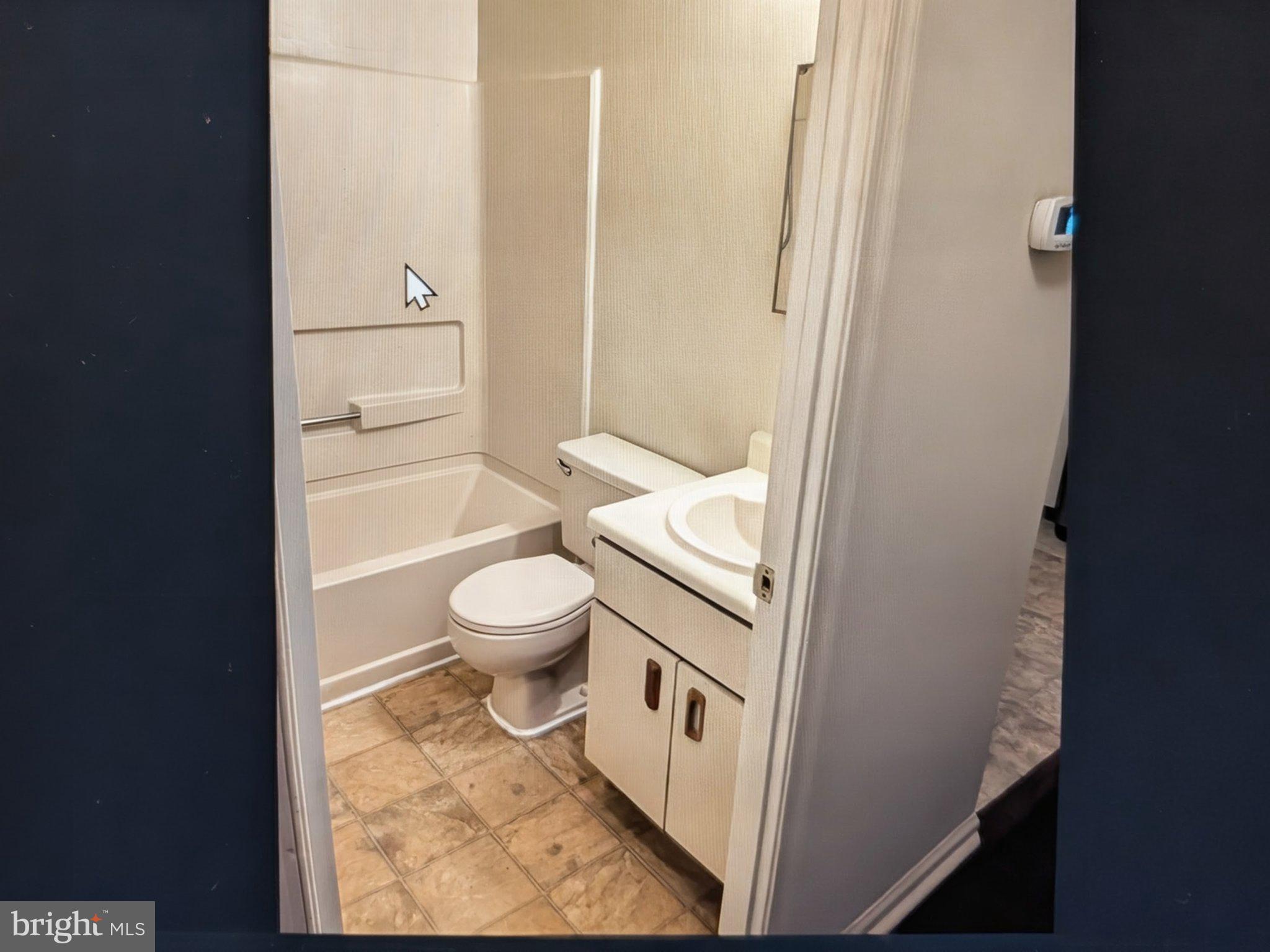 1204 Huntingdon Mews Clementon, NJ 08021 - Photo 6 of 10 a bathroom with a granite countertop toilet and a sink