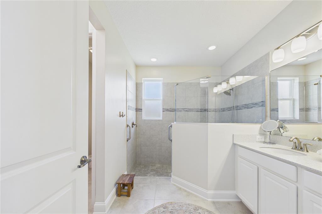 458 Convex Lane St. Augustine, FL 32095 - Photo 27 of 60 a bathroom with a sink a toilet and shower