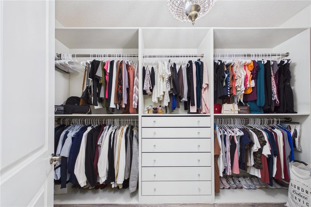 458 Convex Lane St. Augustine, FL 32095 - Photo 30 of 60 a view of walk in closet with clothes and shoes