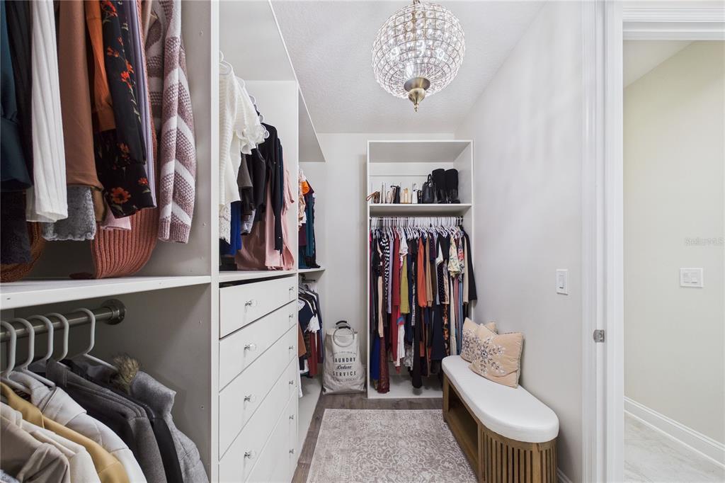 458 Convex Lane St. Augustine, FL 32095 - Photo 31 of 60 a view of walk in closet with clothes and shoes