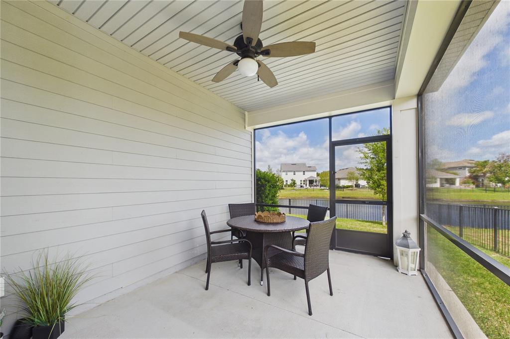 458 Convex Lane St. Augustine, FL 32095 - Photo 42 of 60 a view of a patio with a table chairs and backyard