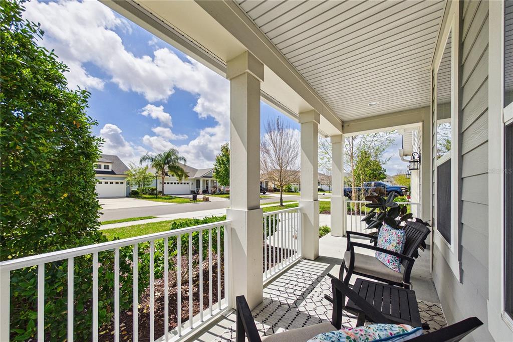 458 Convex Lane St. Augustine, FL 32095 - Photo 5 of 60 a view of a chairs and table in the balcony