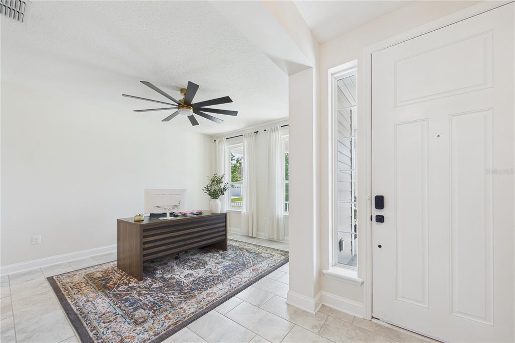 458 Convex Lane St. Augustine, FL 32095 - Photo 6 of 60 a view of room with wooden floor and ceiling fan