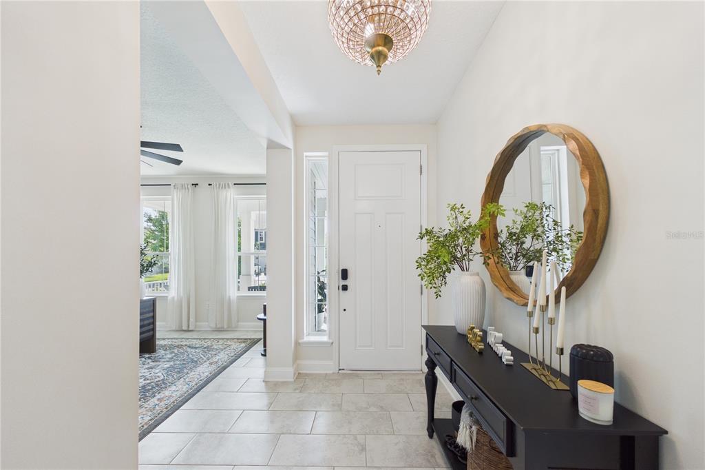 458 Convex Lane St. Augustine, FL 32095 - Photo 9 of 60 a view of a hallway to a livingroom with furniture
