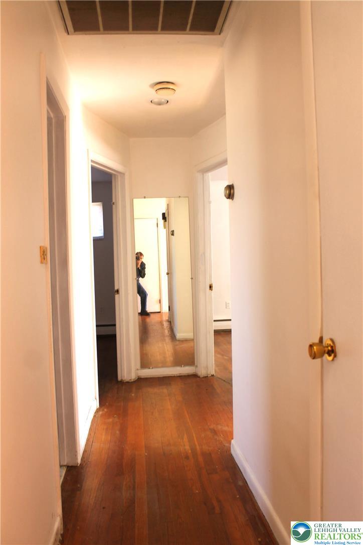 2465 Jacksonville Road Bethlehem, PA 18017 - Photo 15 of 28 a view of a hallway with wooden floor