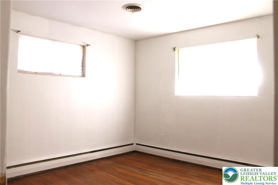 2465 Jacksonville Road Bethlehem, PA 18017 - Photo 21 of 28 a view of a small space with wooden floor and a window