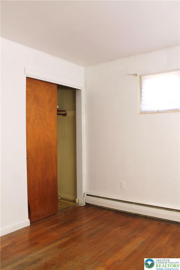 2465 Jacksonville Road Bethlehem, PA 18017 - Photo 22 of 28 a view of an empty room with wooden floor