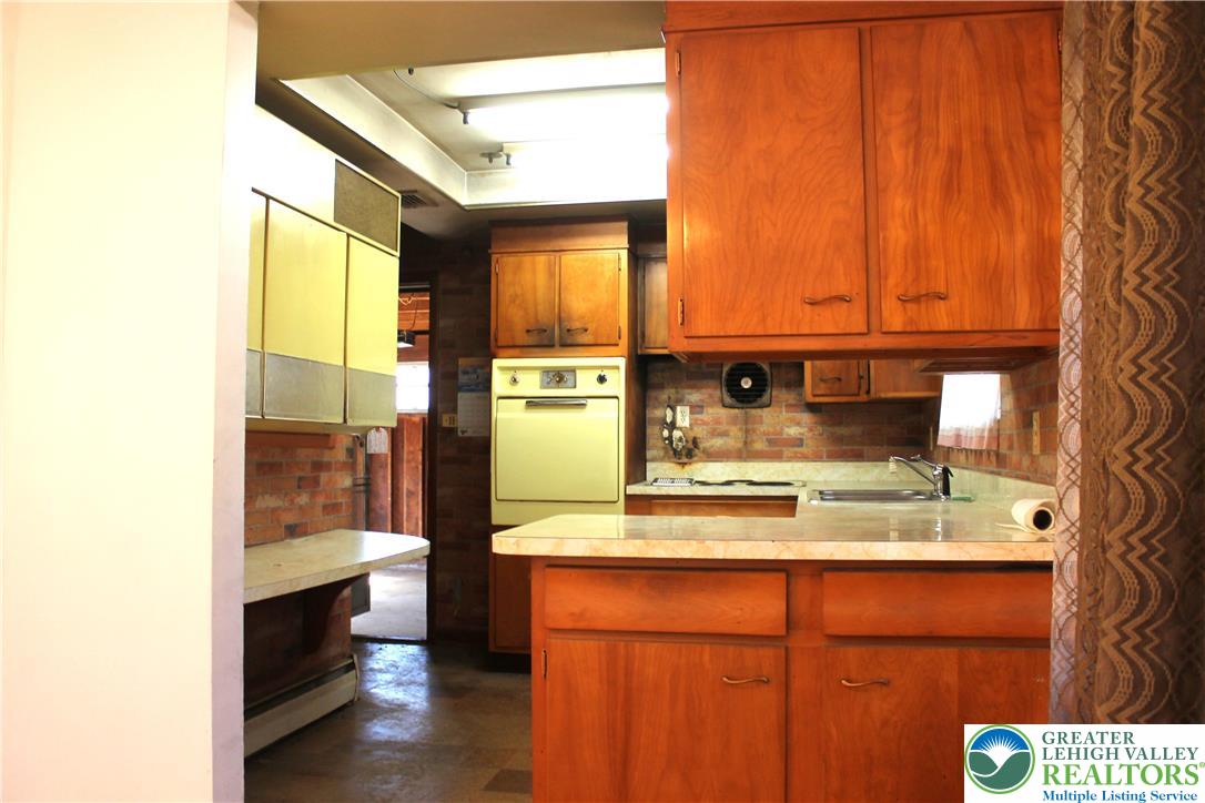 2465 Jacksonville Road Bethlehem, PA 18017 - Photo 7 of 28 a kitchen with a window and cabinets