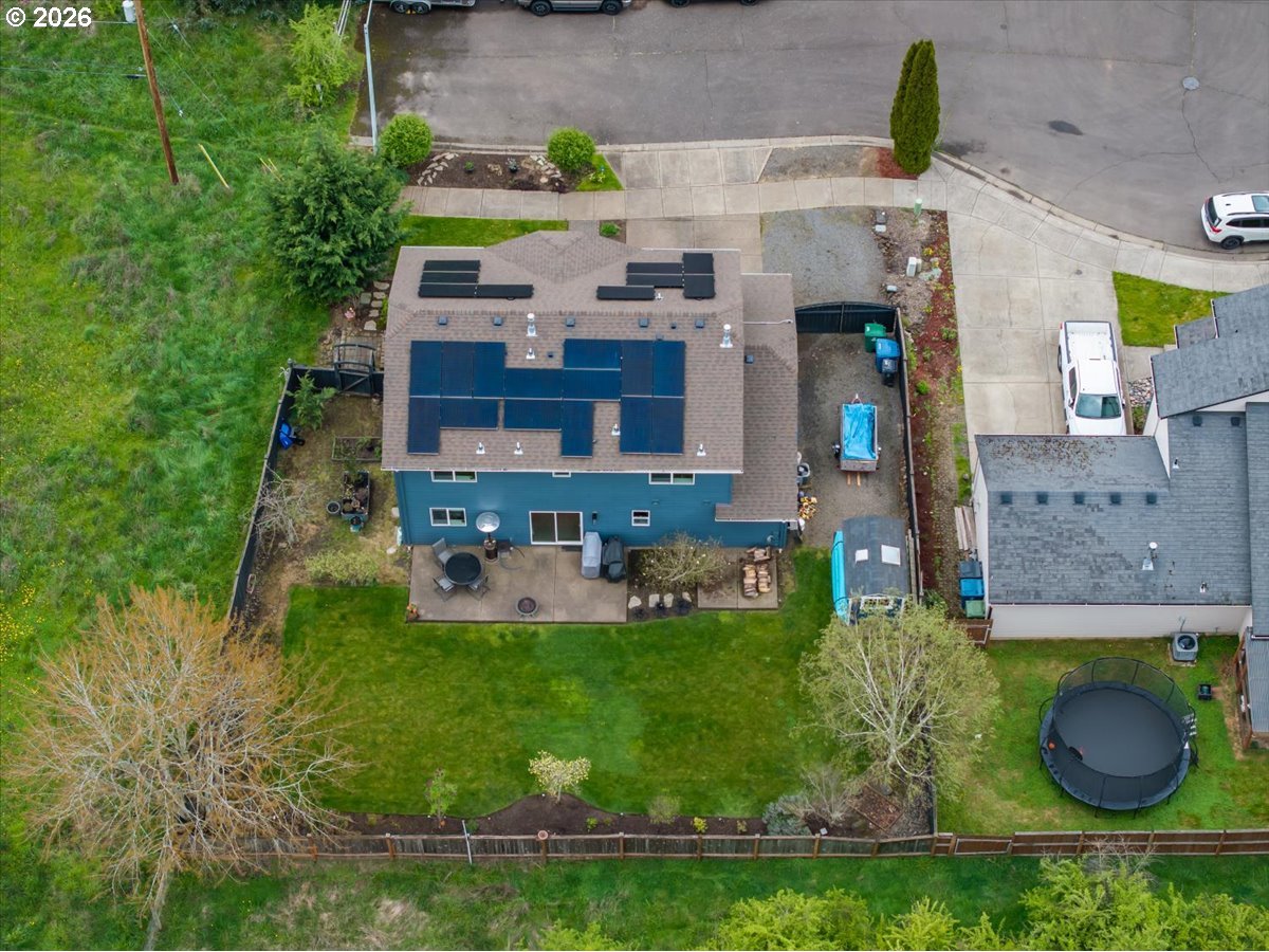 302 Division Street Northeast Silverton, OR 97381 - Photo 45 of 48 an aerial view of a house with yard basket ball court and outdoor seating
