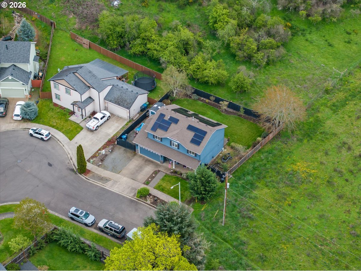 302 Division Street Northeast Silverton, OR 97381 - Photo 46 of 48 an aerial view of a house with a garden