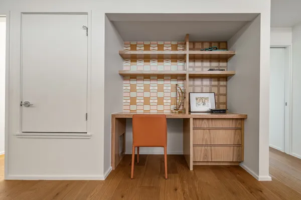 a kitchen with a window a sink and a refrigerator