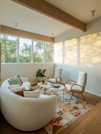 a kitchen with a sink and a large window