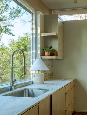 a view of a backyard of the house