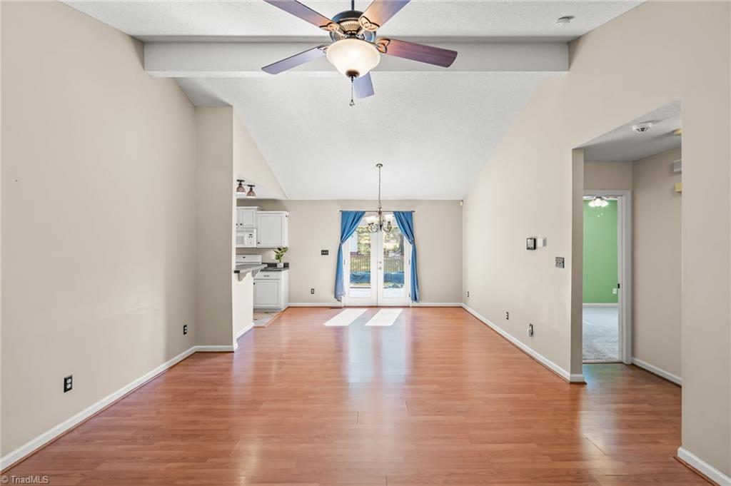View into living area and dining area from front door