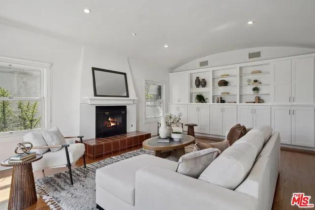 a view of a livingroom with furniture and window