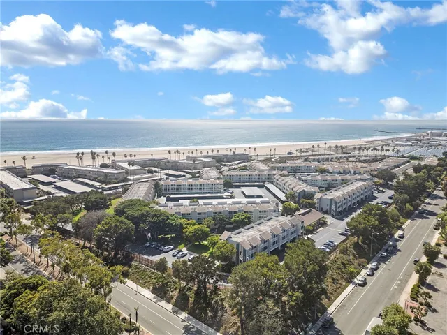 a swimming pool with outdoor seating and yard