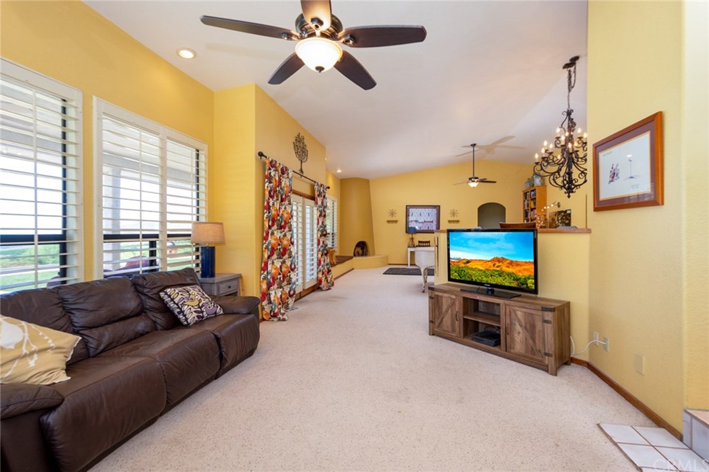 47810 Bee Canyon Truck Trail Hemet, CA 92544 - Photo 13 of 43 a living room with furniture and a flat screen tv