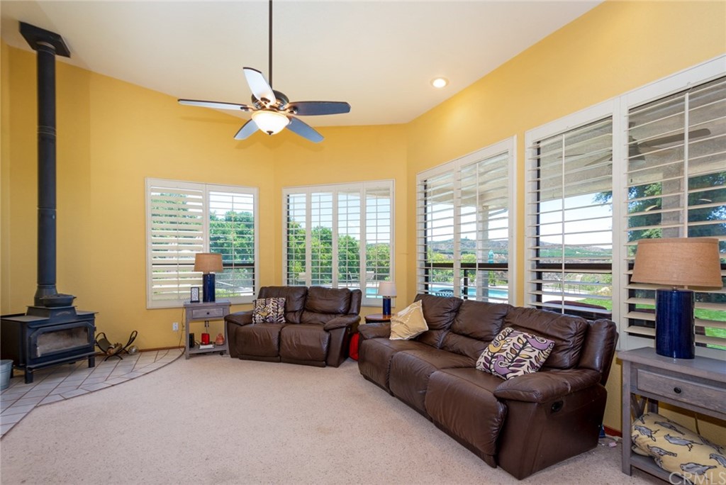 47810 Bee Canyon Truck Trail Hemet, CA 92544 - Photo 15 of 43 a living room with furniture and a large window