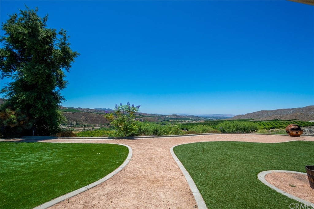 47810 Bee Canyon Truck Trail Hemet, CA 92544 - Photo 34 of 43 an aerial view of a garden with houses