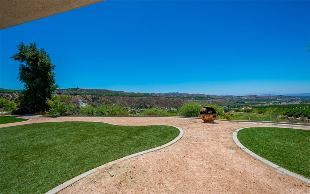 47810 Bee Canyon Truck Trail Hemet, CA 92544 - Photo 36 of 43 a view of a swimming pool with a yard