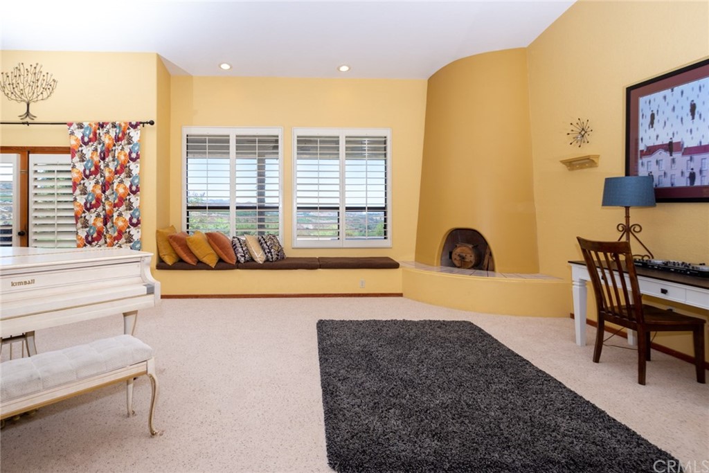 47810 Bee Canyon Truck Trail Hemet, CA 92544 - Photo 7 of 43 a living room with furniture and a floor to ceiling window