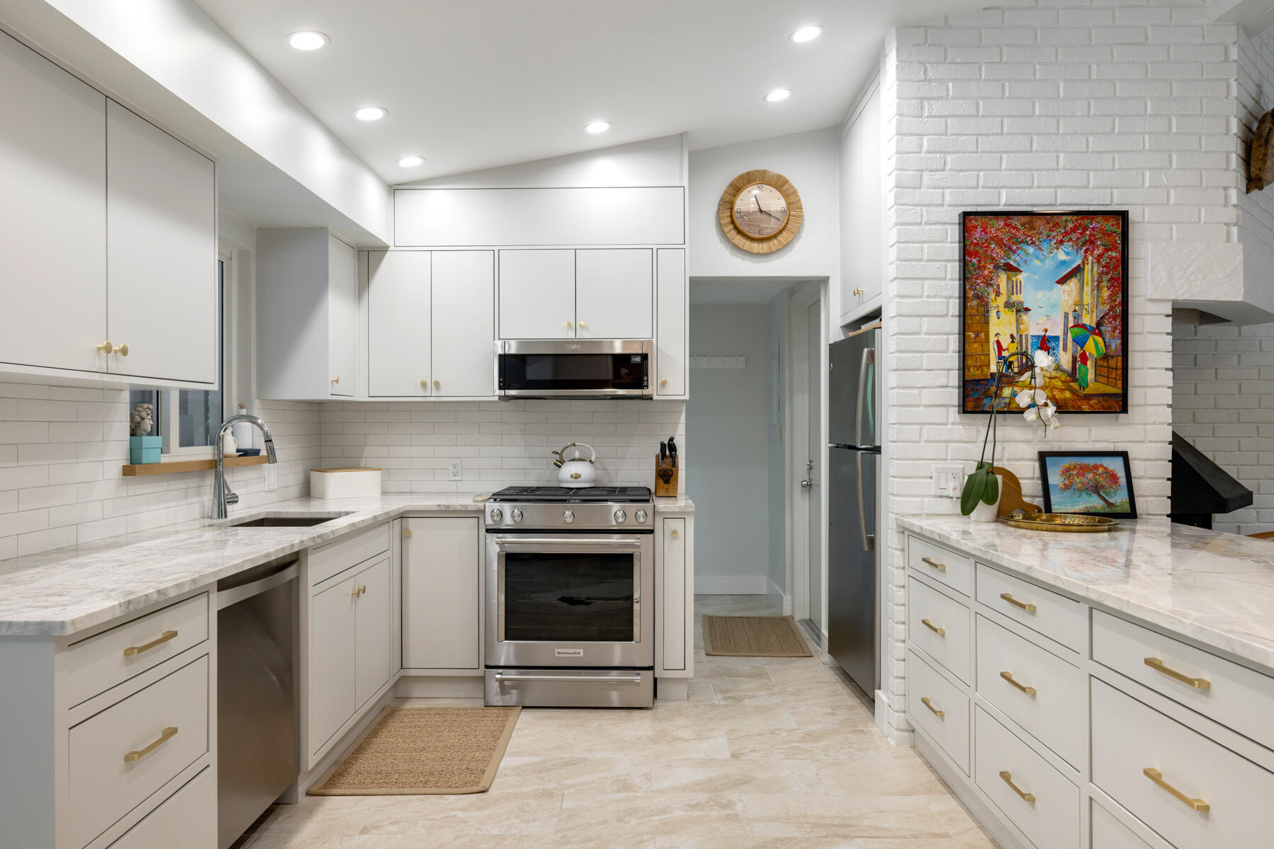 32 Park Road Islamorada, FL 33036 - Photo 9 of 48 a kitchen with stainless steel appliances granite countertop a stove a sink and a refrigerator