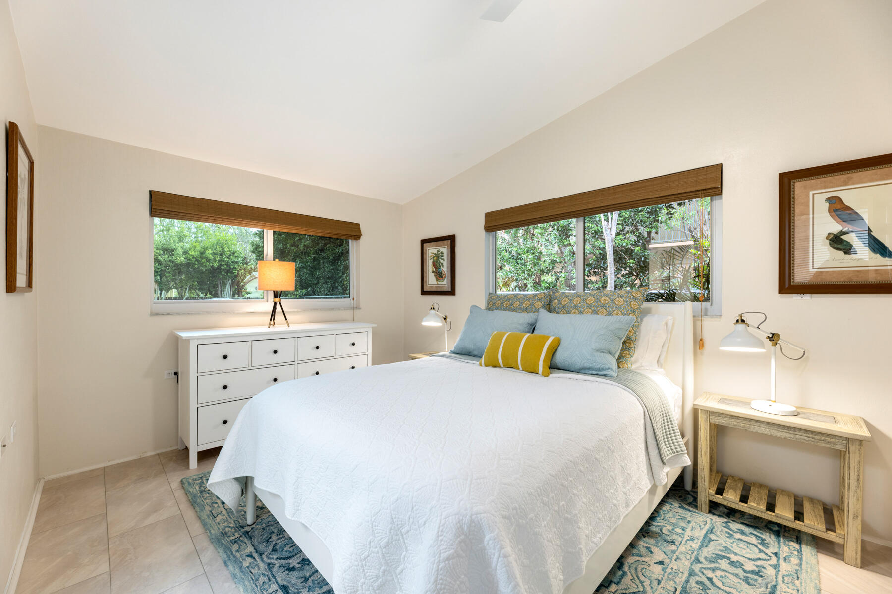 32 Park Road Islamorada, FL 33036 - Photo 13 of 48 a bedroom with a bed and wooden floor