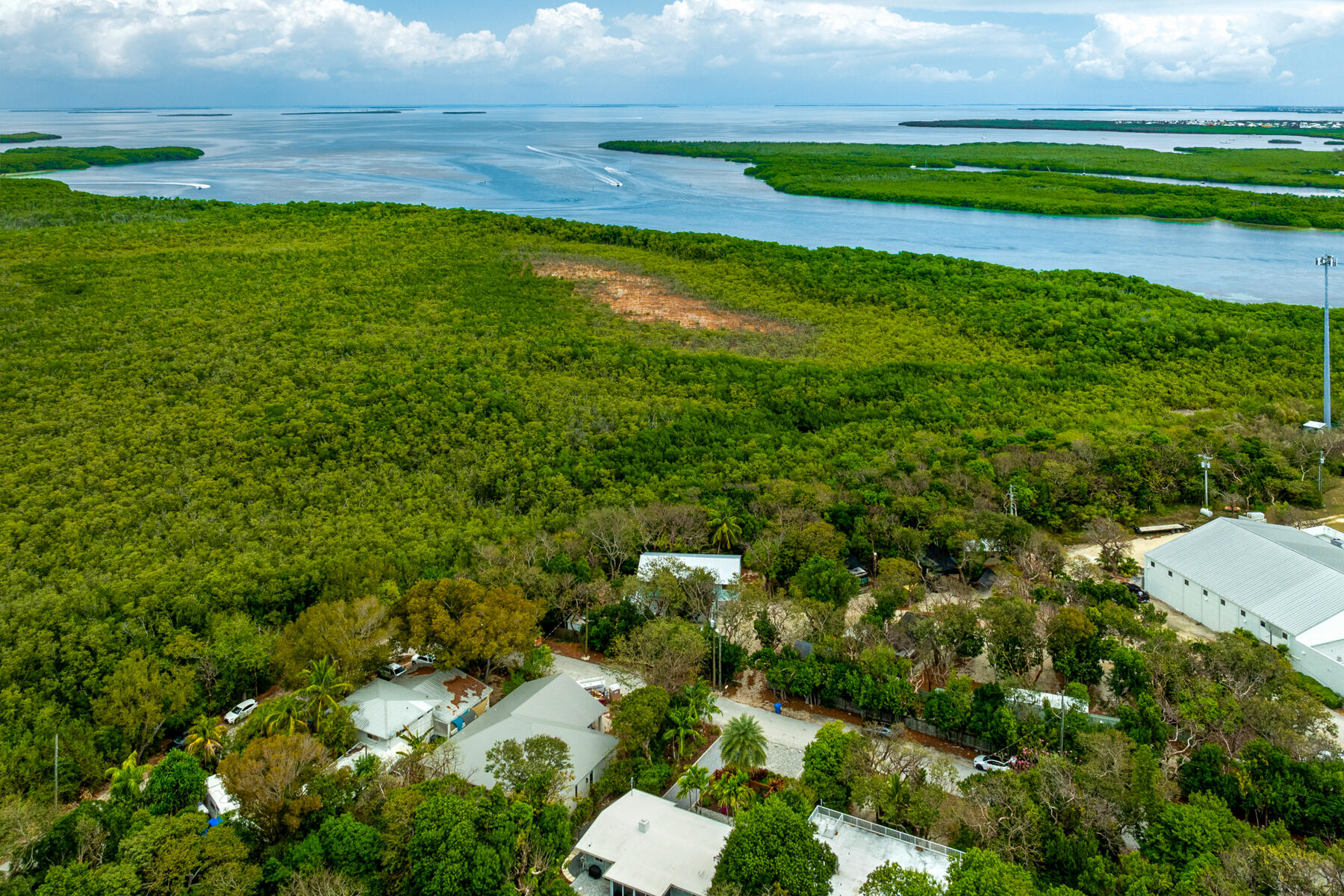 32 Park Road Islamorada, FL 33036 - Photo 36 of 48 a view of a golf course with a lake